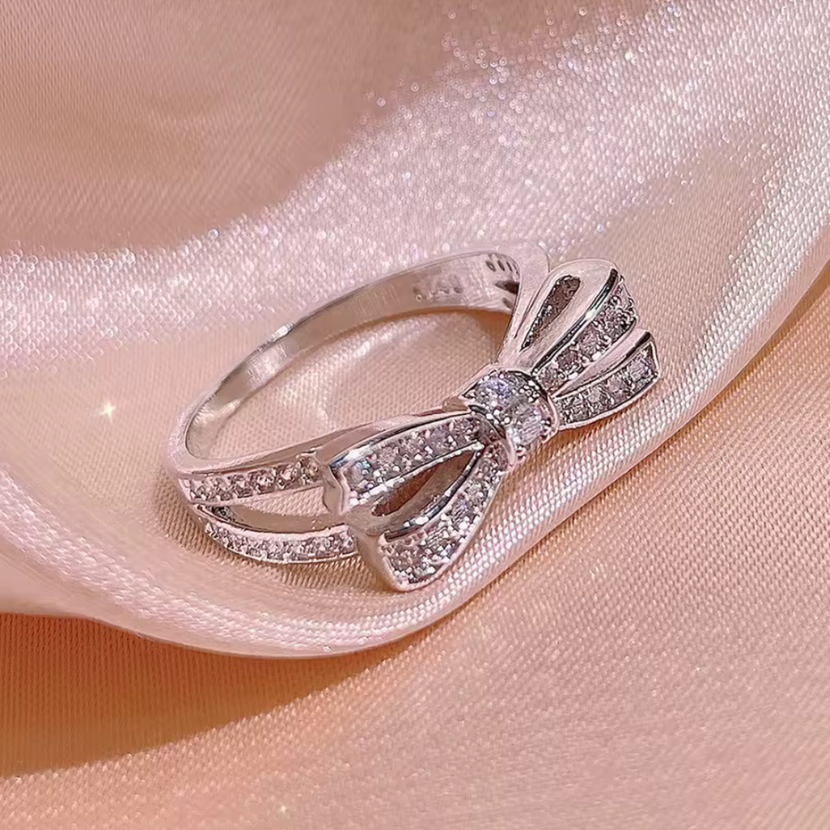 Anillo de Lazo doble Zirconias montadas en Plata .925